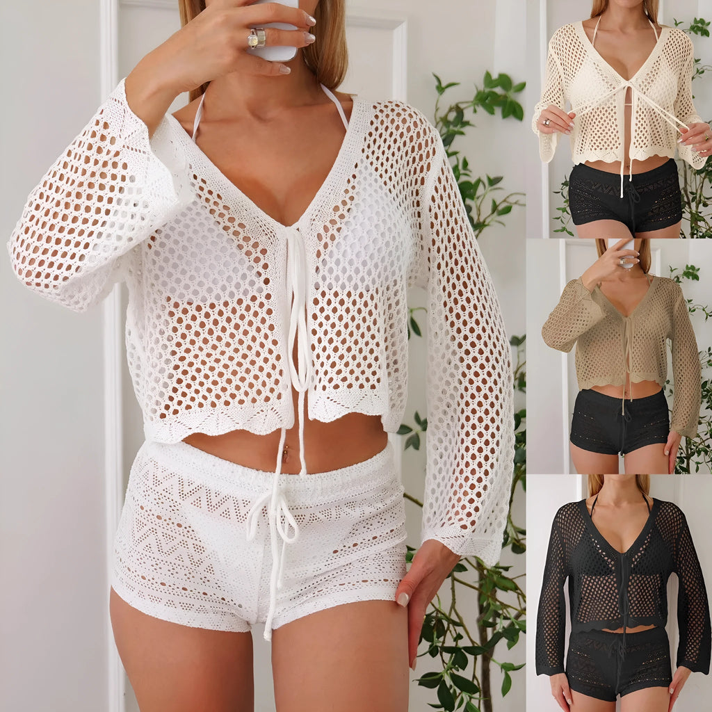 Short length women's cardigan blouse with bell sleeves in a choice of colours.