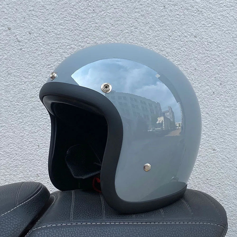 FRP retro half motorcycle helmet shown in cement grey colour for electric motorcycle commuting