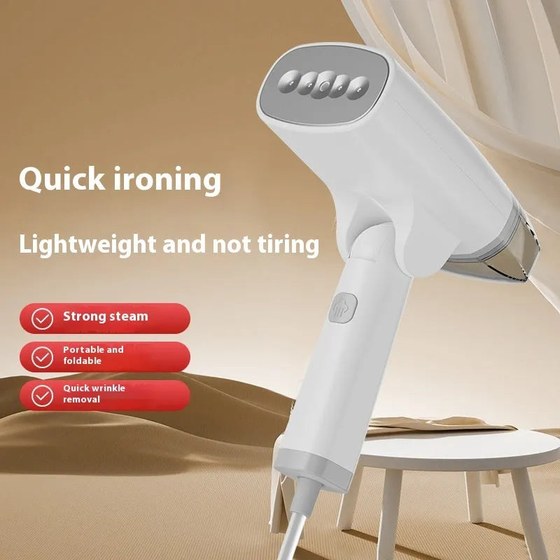Blue handheld garment steamer with mechanical controls and hanging function