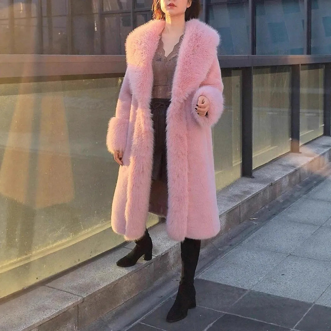 Grey women's mid-length coat with faux fur body, leather detailing, and a matching artificial fur collar.