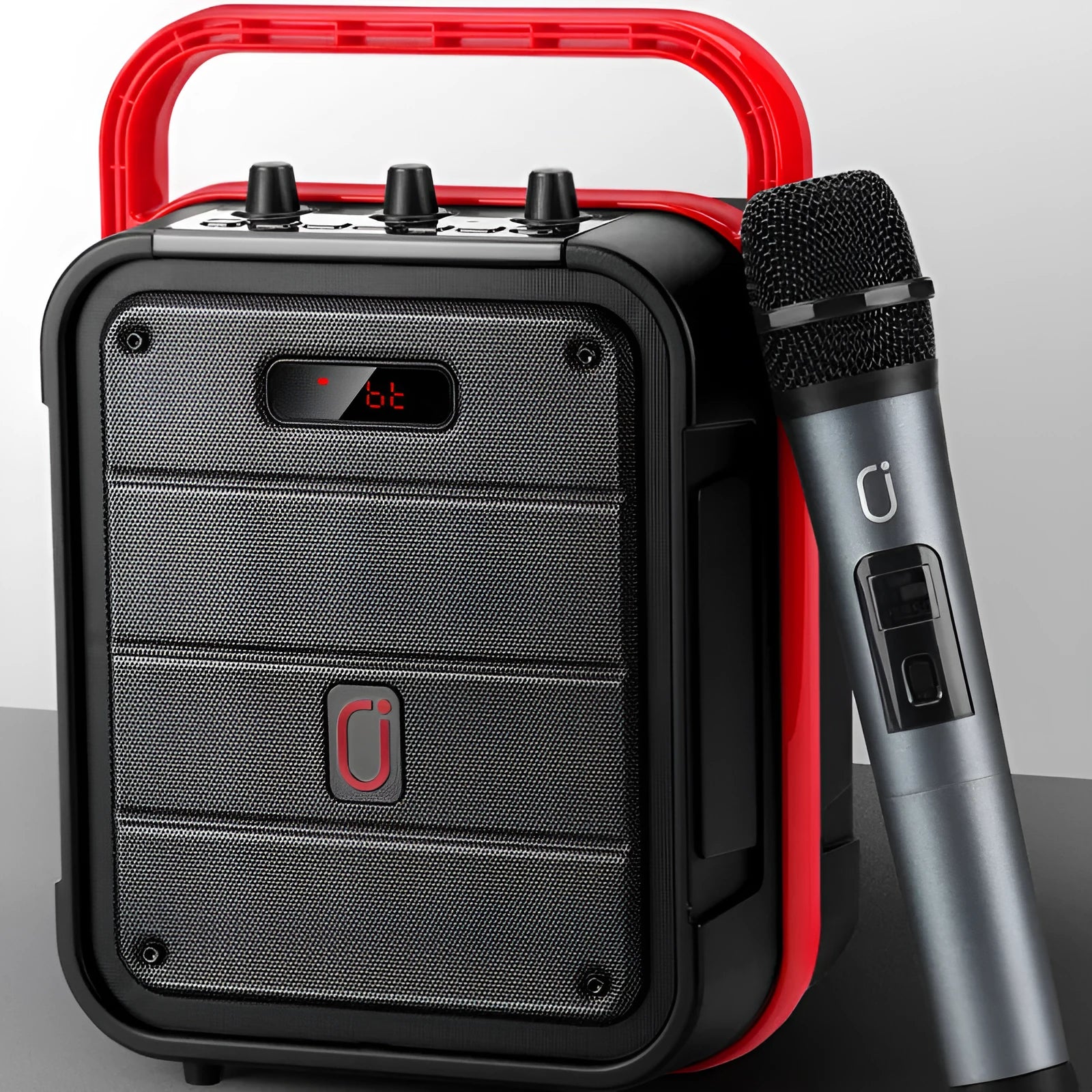 6.5-inch portable Bluetooth speaker with wireless microphone, measuring 241x145x329mm in plastic housing