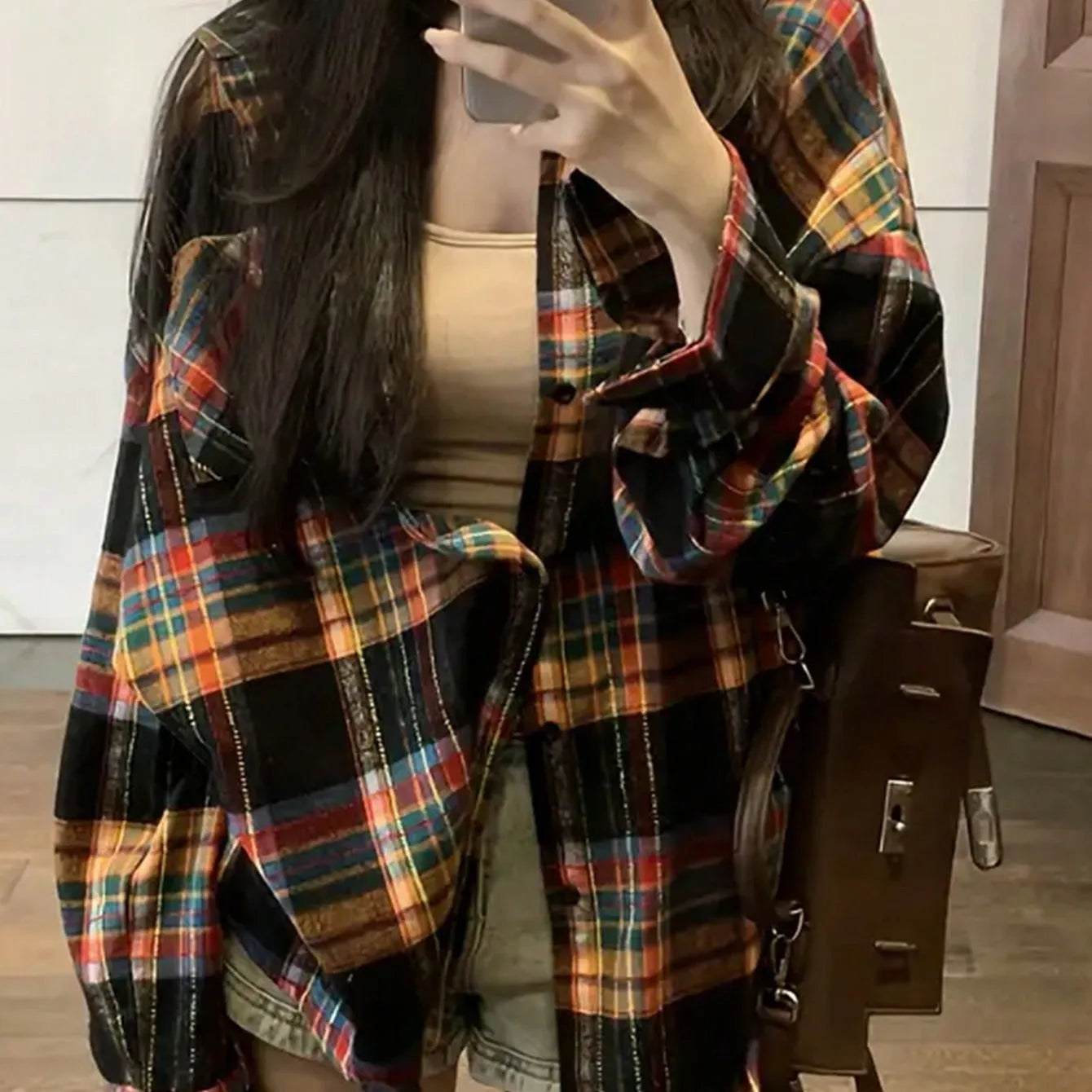 Women's loose-fit retro plaid cotton shirt in black, shown front-on with long sleeves.