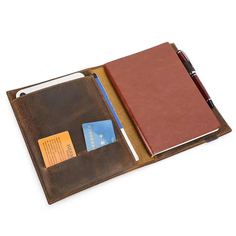 Brown Crazy Horse leather protective sleeve for an A5 paper notebook.