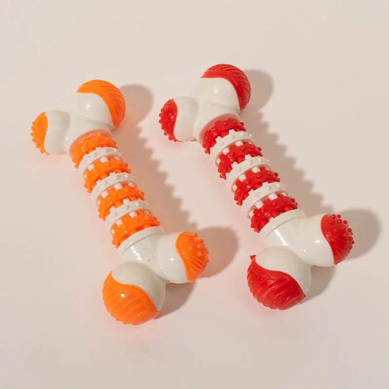 Small dog bone chew toy with treat dispenser centre in blue, orange and red colours