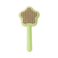 Green self-cleaning stainless steel pet comb with a magic wand handle on a white background.