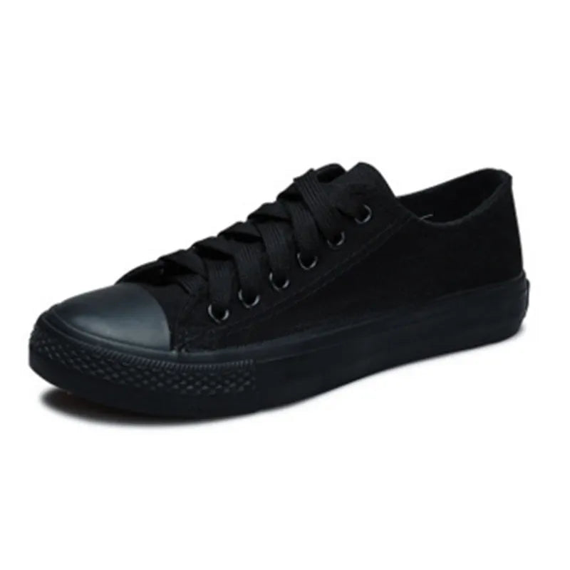Women's canvas shoes in solid colours including black, white-black, white-red, and all-black variations