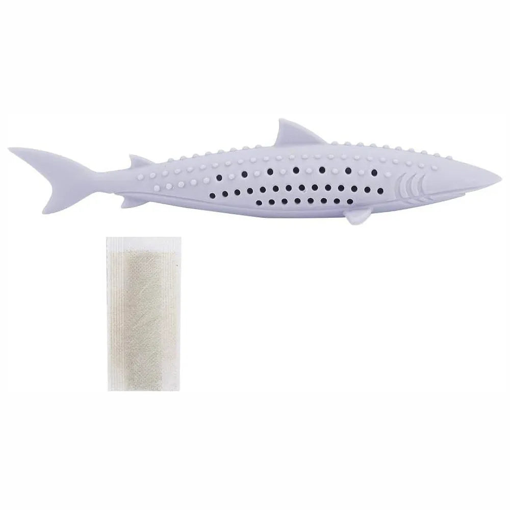 Green silicone fish shaped cat chew toy with breathable side holes on a white background