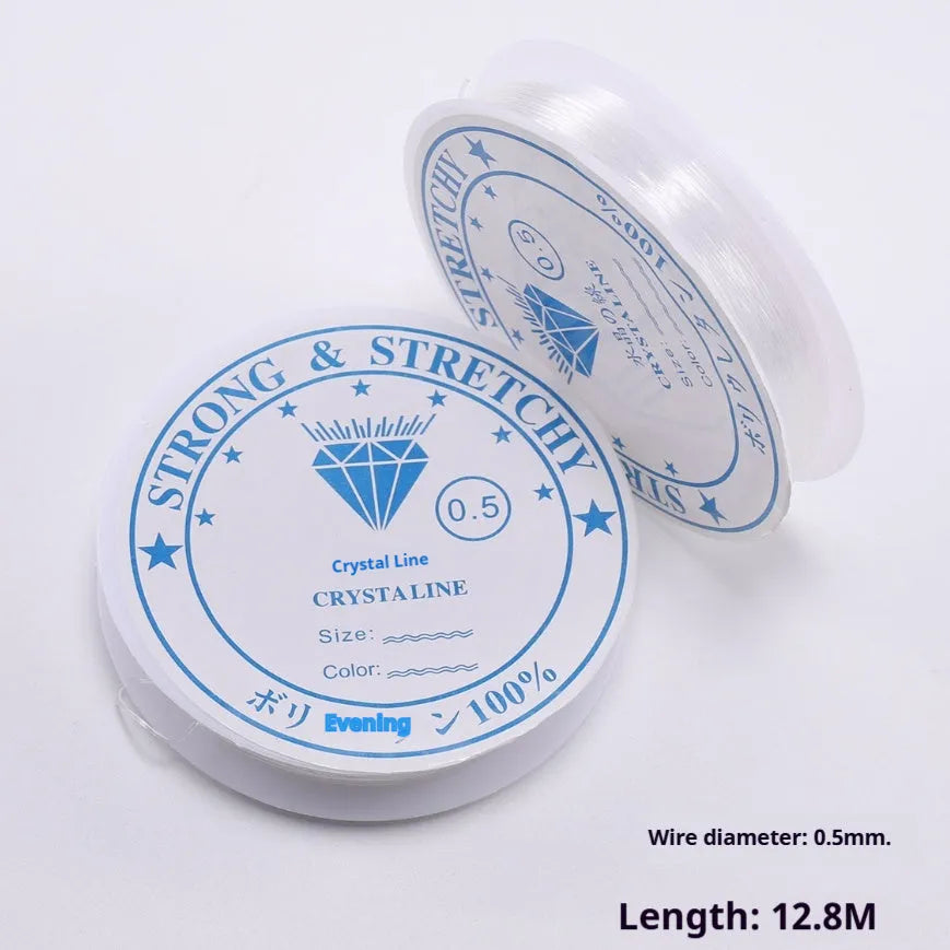 Roll of transparent white elastic fishing line cord for DIY jewellery making, showing six diameter size options.