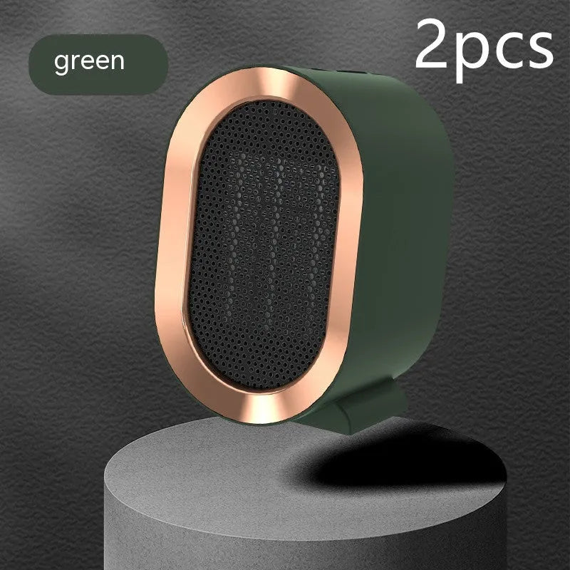 Black desktop electric fan heater with mechanical dial controls and ceramic heating technology