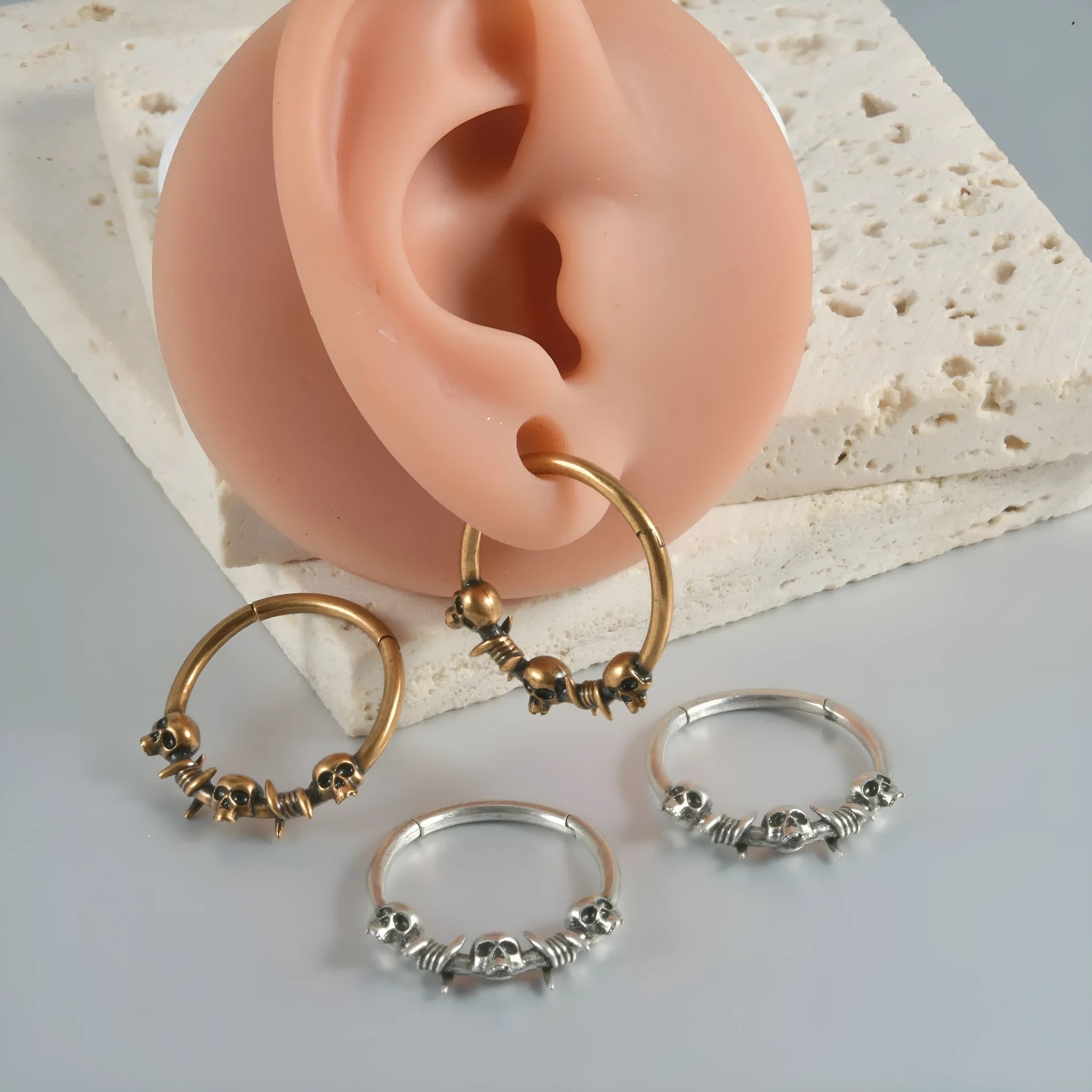 Copper ghost head punk earrings in antique silver and gold colours