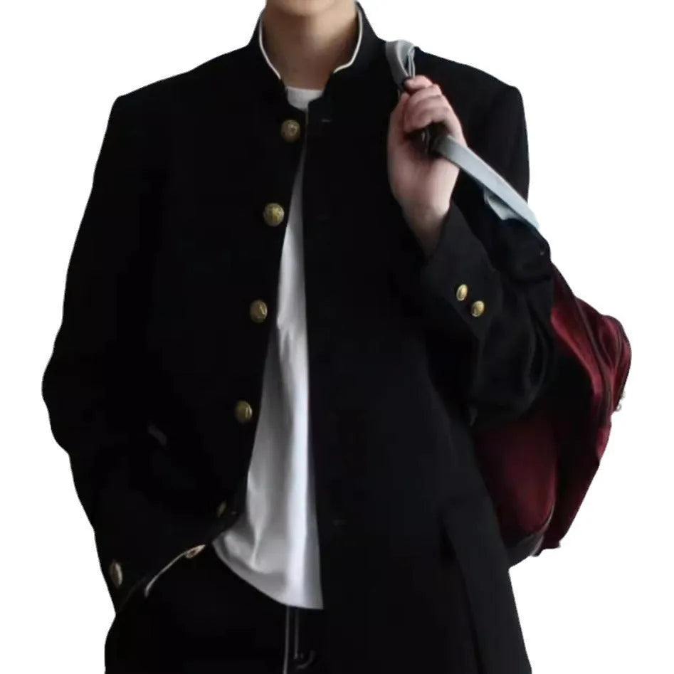 Solid black Korean style casual suit blazer with long sleeves, loose fit, and patch pockets on model