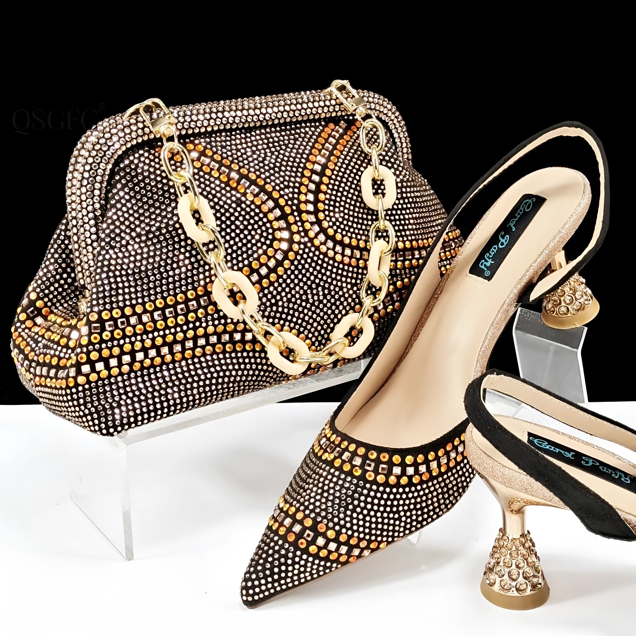 Women's pointed toe high heel shoes with decorative rhinestones and a matching small bag, shown in blue.