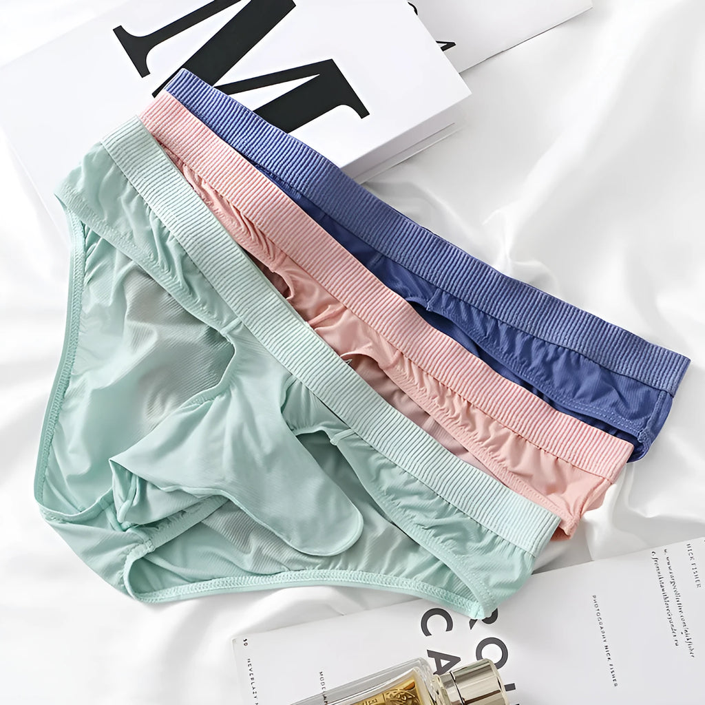 Men's low waist ice silk briefs in black, grey, light green, pink, and purplish blue colours.