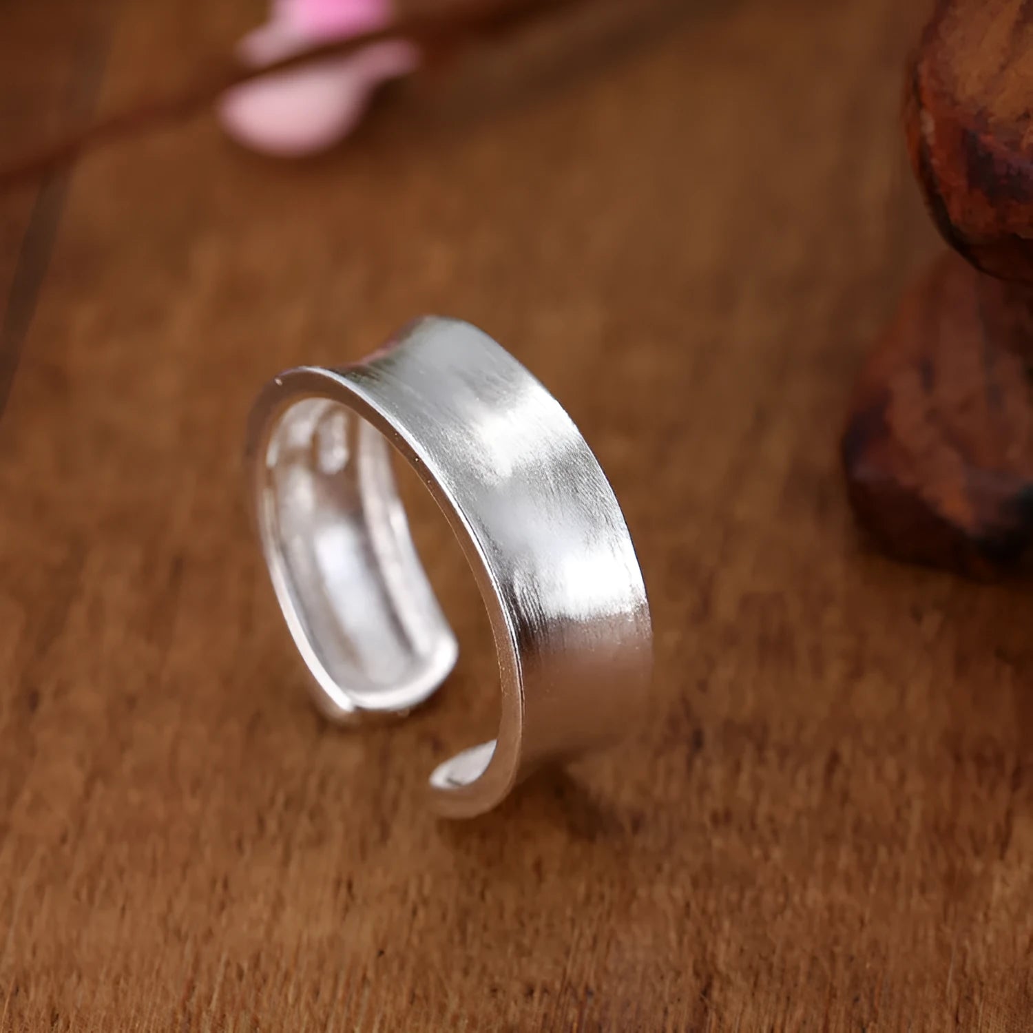 Geometric adjustable open ring with frosted sterling silver finish and Korean-inspired design