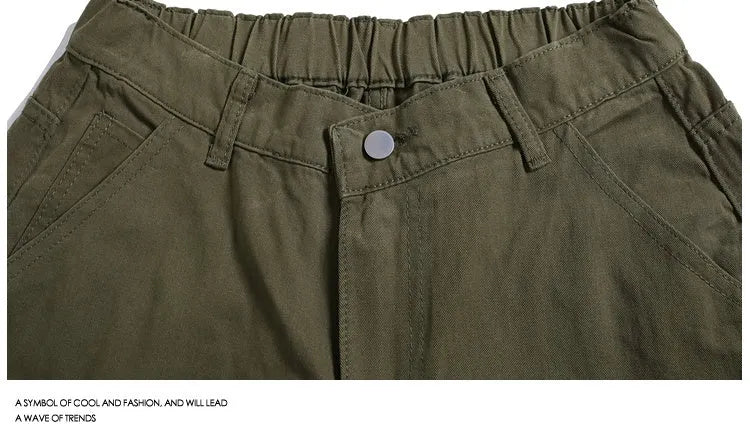 Women's workwear rivet cropped pants in wide-leg design showing apricot colour option with mid waist