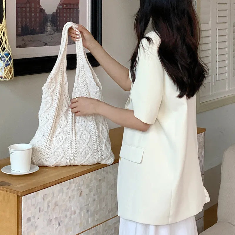 Retro style hollow knitted women's tote bag in a solid colour with double shoulder straps