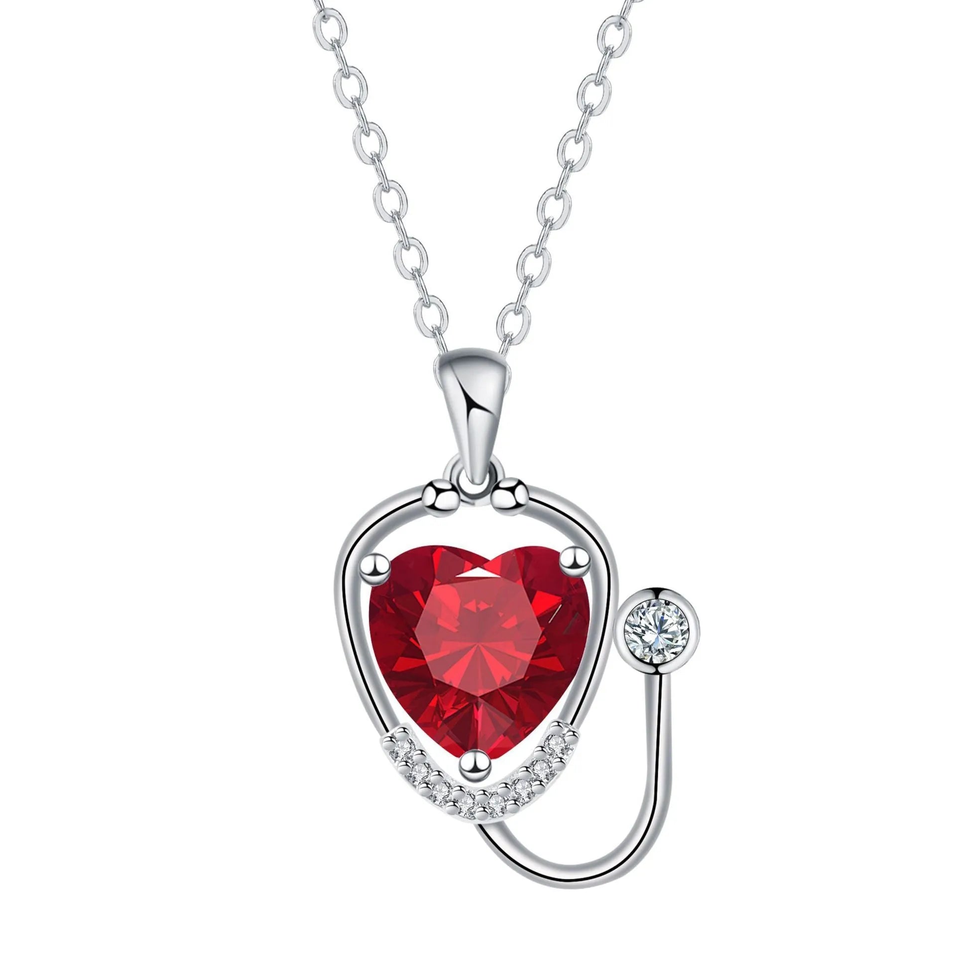 Women's copper necklace with cross, wings, and stethoscope charm in red diamond colour.