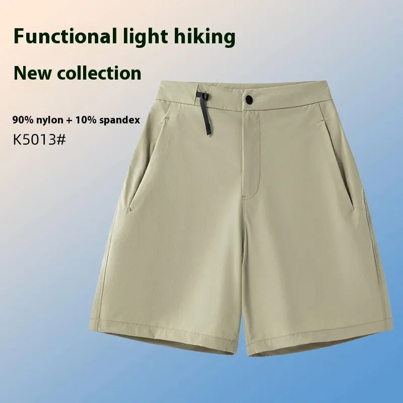 Men's khaki quick-drying sports shorts with 3D elastic cutting on a grey background.