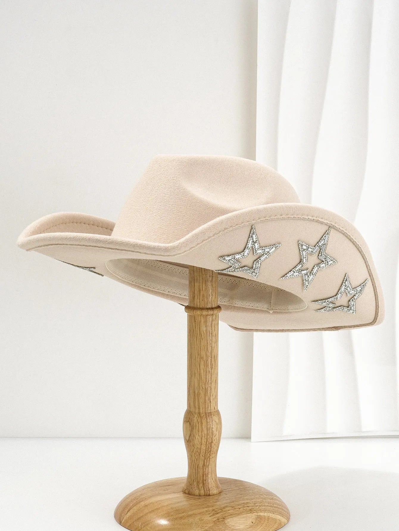 Brown polyester western-style top hat with a conical crown and a silver hexagonal star decoration on the front.