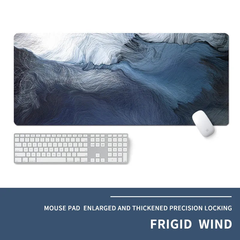 Oversized gaming mouse pad with printed design showing multiple size options and integrated wrist rest