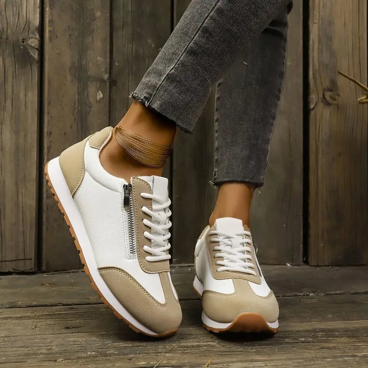 Women's flat-heeled casual shoes in champagne, grey, and white colours with artificial PU upper.