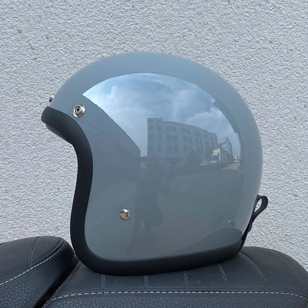 FRP retro half motorcycle helmet shown in cement grey colour for electric motorcycle commuting