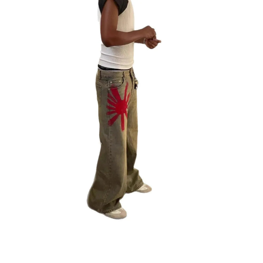Men's wide-leg blue denim trousers with straight-leg cut and zipper fly, laid flat on a neutral background