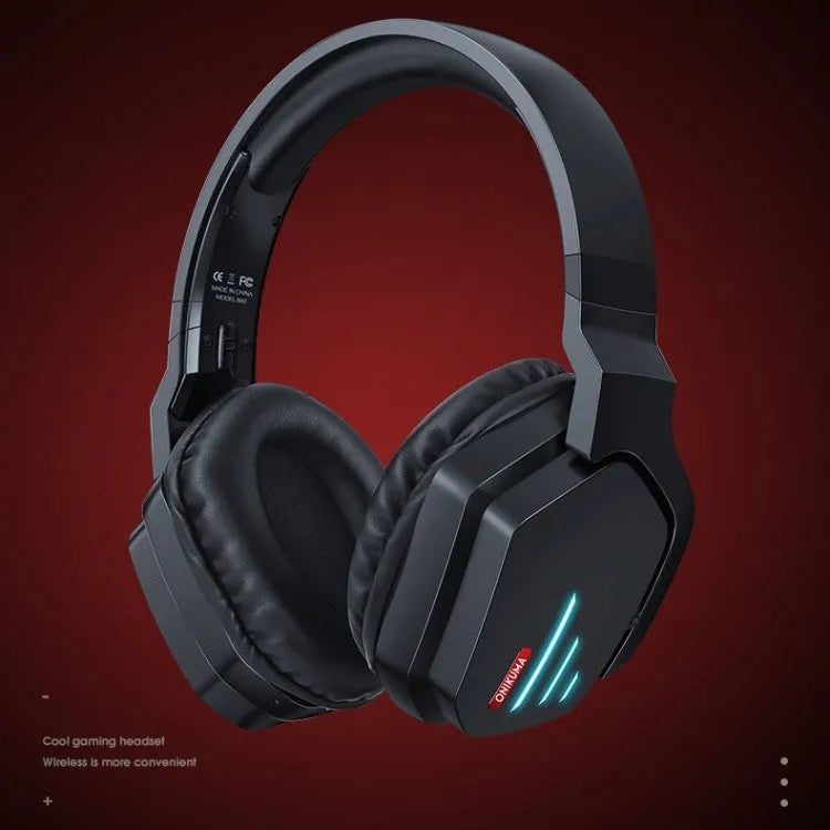 Luminous black wireless over-ear headphones with a headband, shown with a 3.5mm audio cable.