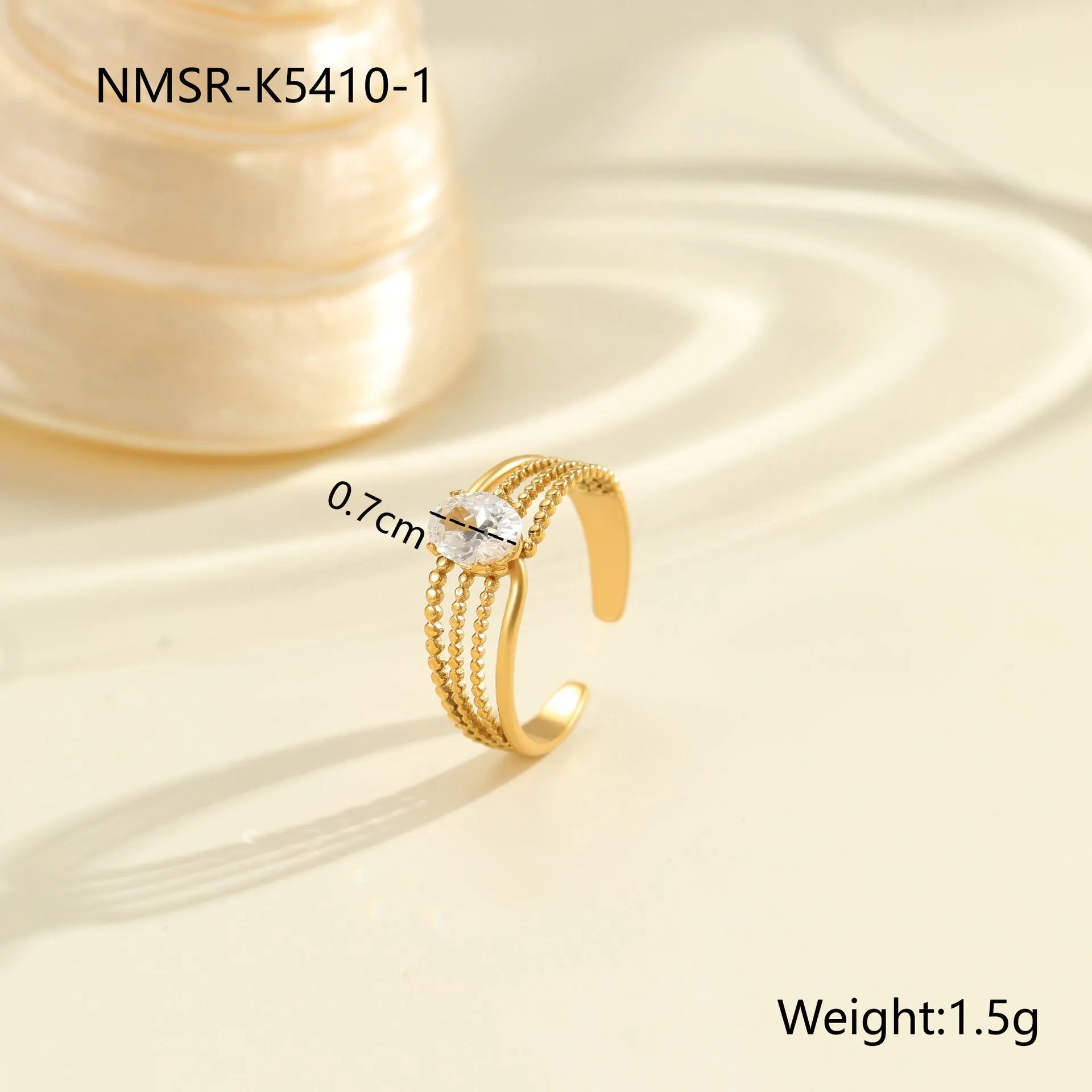 Open mouth geometric stainless steel ring with heart drop shape and gold inlaid zircon.