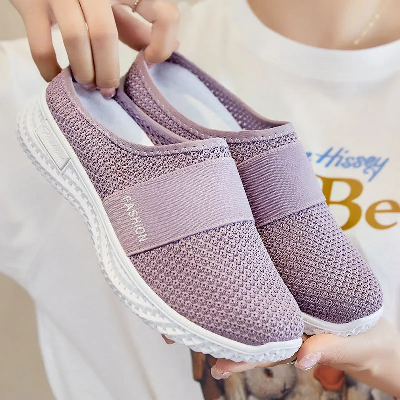 Women's breathable mesh casual shoes with hollow-out detailing and flat heel in round toe design