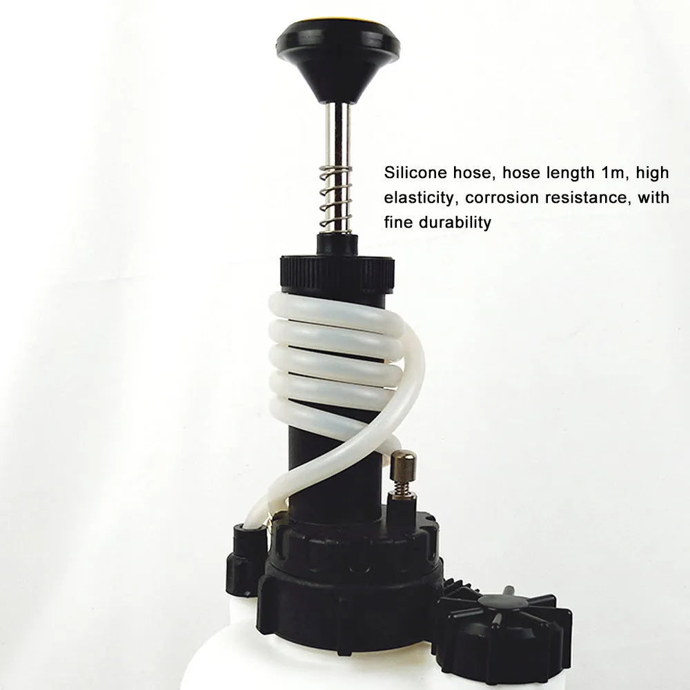 White plastic 3-litre brake fluid tank tool with copper and iron fittings for automotive service.