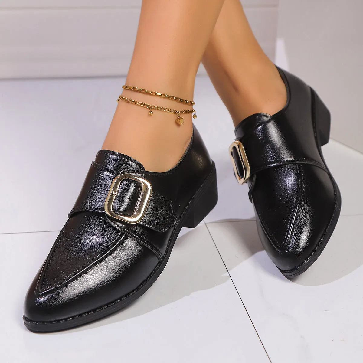 Women's British-style leather shoes with a decorative bow, rubber sole, and pointed toe.