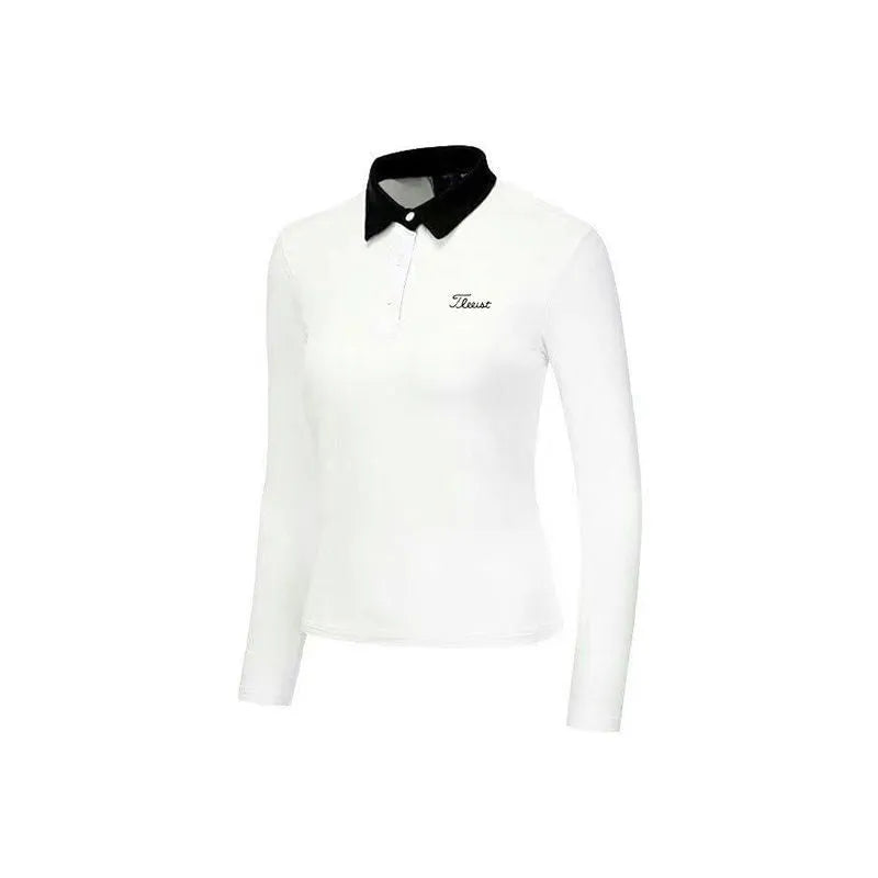 Women's slim-fit long sleeve polyester golf top in black on a hanger.