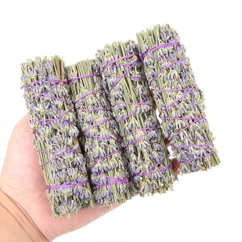 A single 4-inch long lavender aromatherapy stick made from natural dried flowers on a plain background.