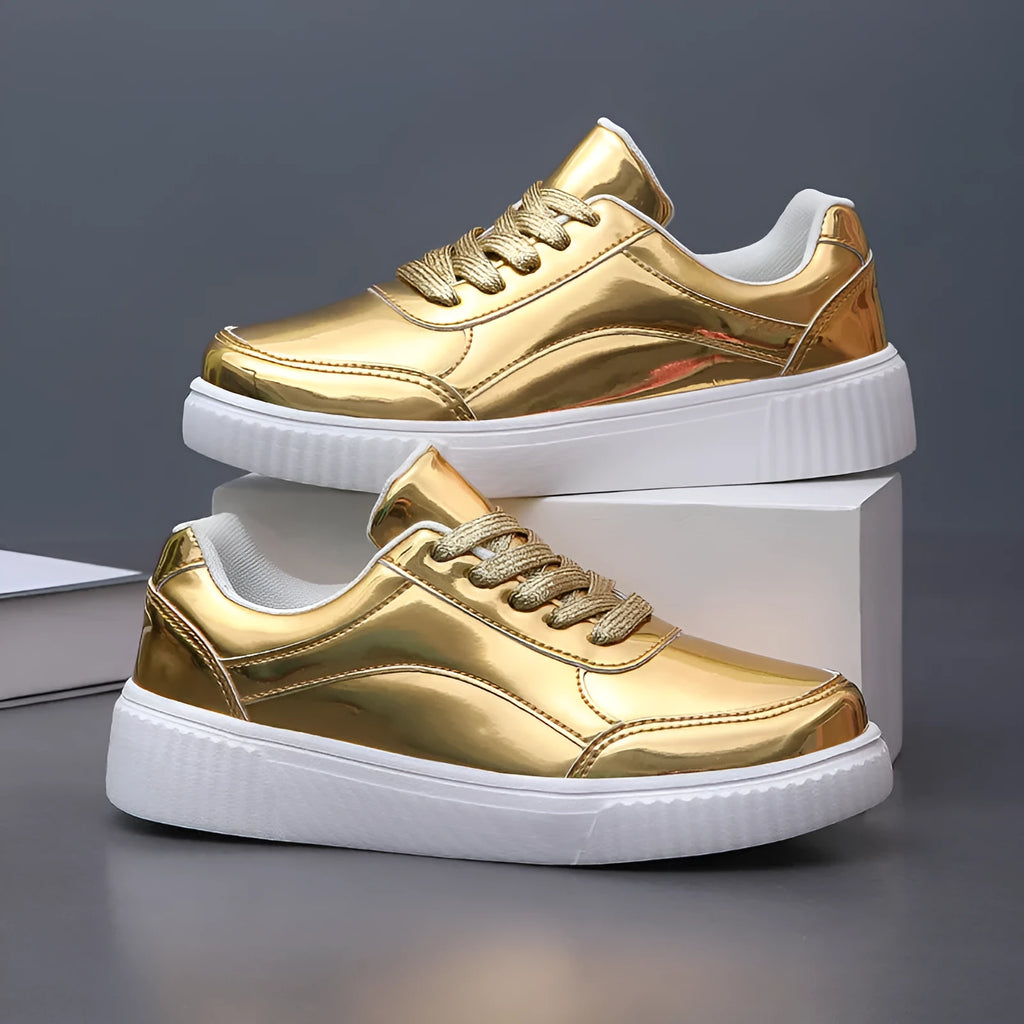 Gold sequinned platform sneaker with round toe and thick MD sole.