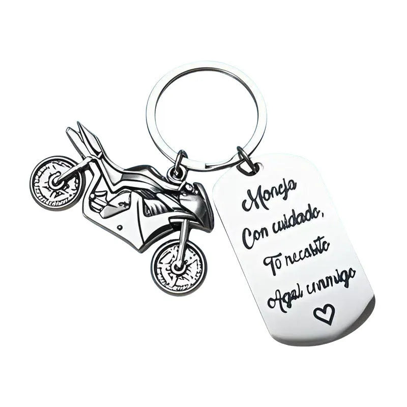 Stainless steel motorcycle key chain with inspirational design and included flannel storage bag