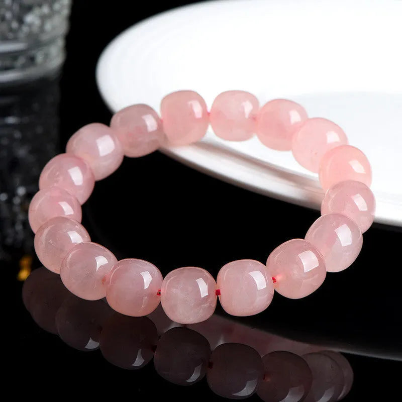 Pink crystal barrel bead bracelet with geometric design and 8 x 10mm bead sizing