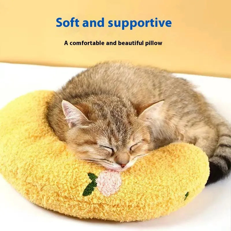 Blue U-shaped cat neck protection pillow with question mark design on white background