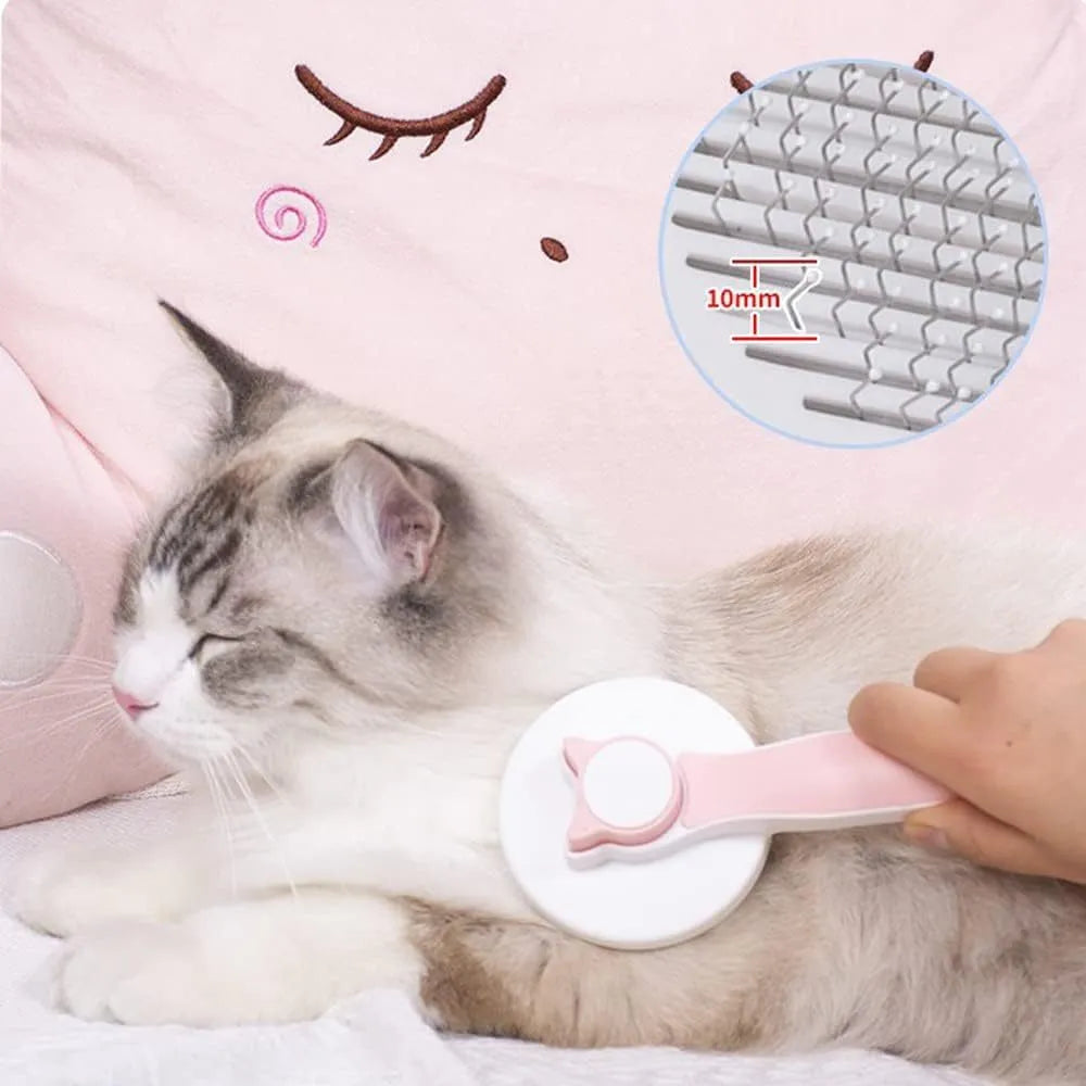 Blue self-cleaning cat and dog brush with rubber handle and retractable pins