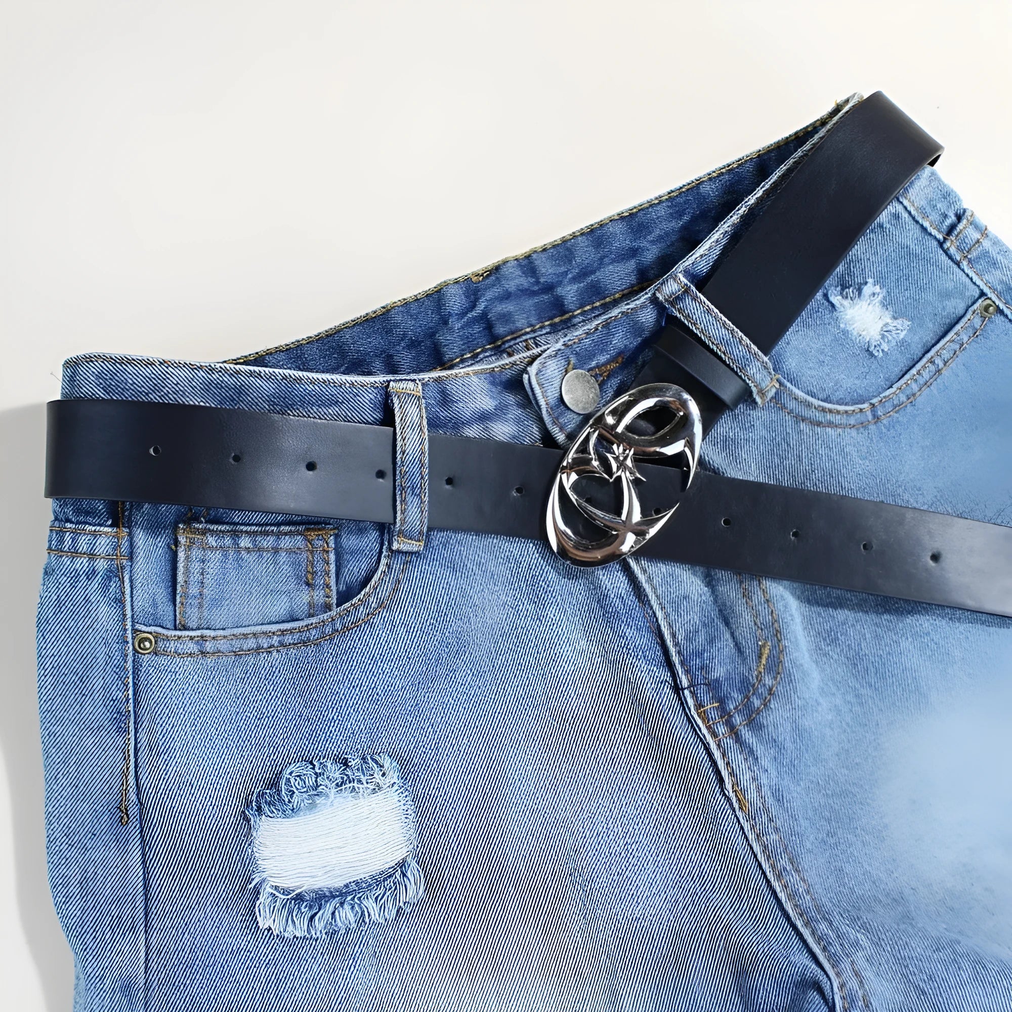 Silver alloy buckle on 3.3cm wide PU leather belt showing snap button fastening