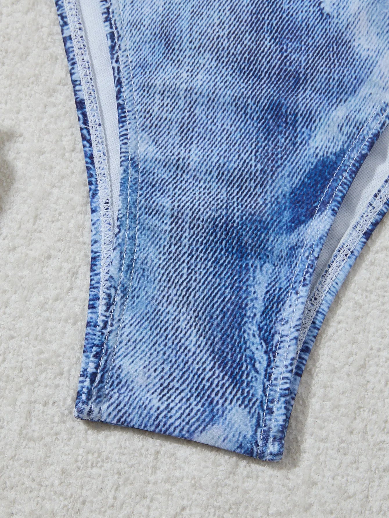 Women's denim blue printed bikini with adjustable straps, shown front view