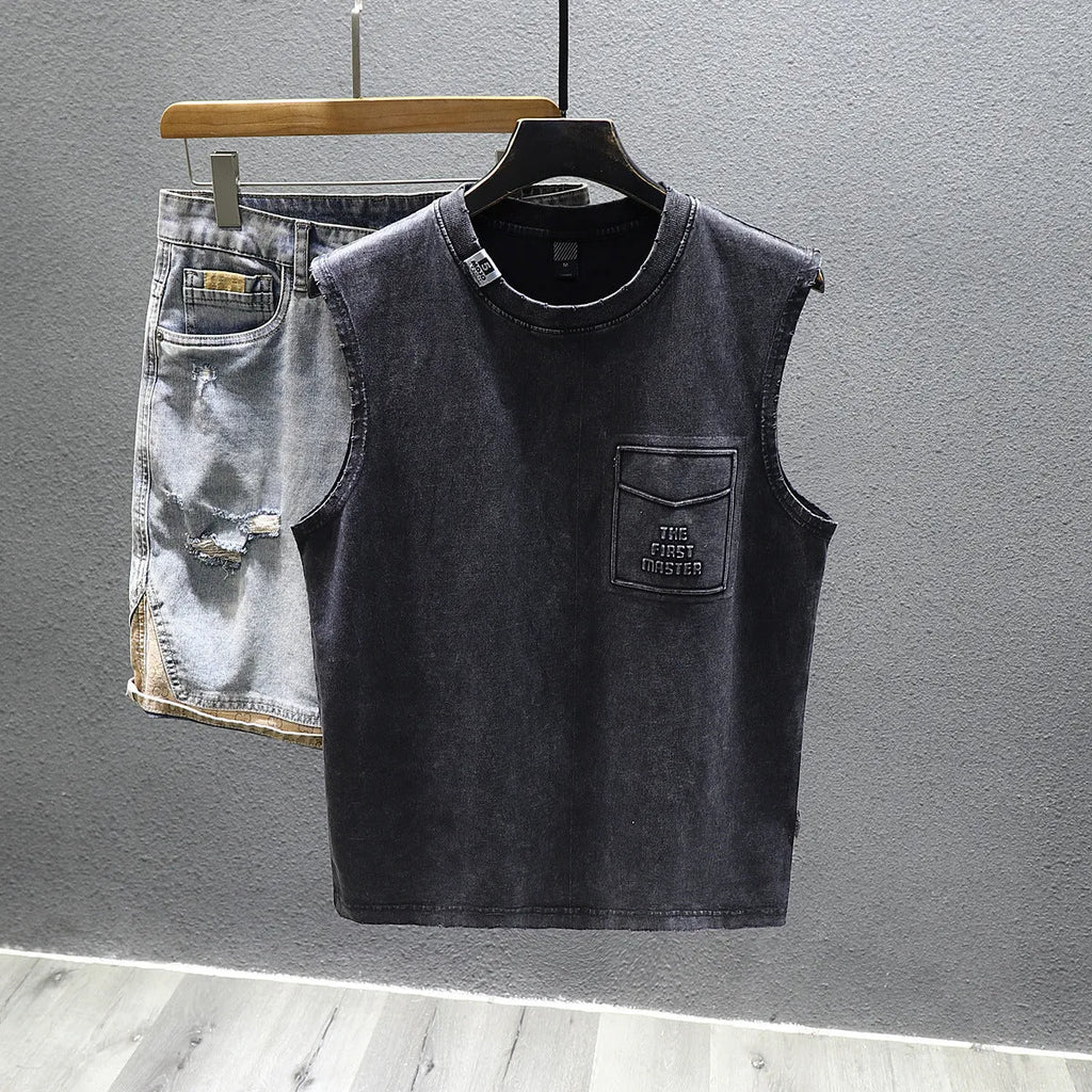 Men's solid colour cotton sleeveless t-shirt in loose fit, shown in white and black.