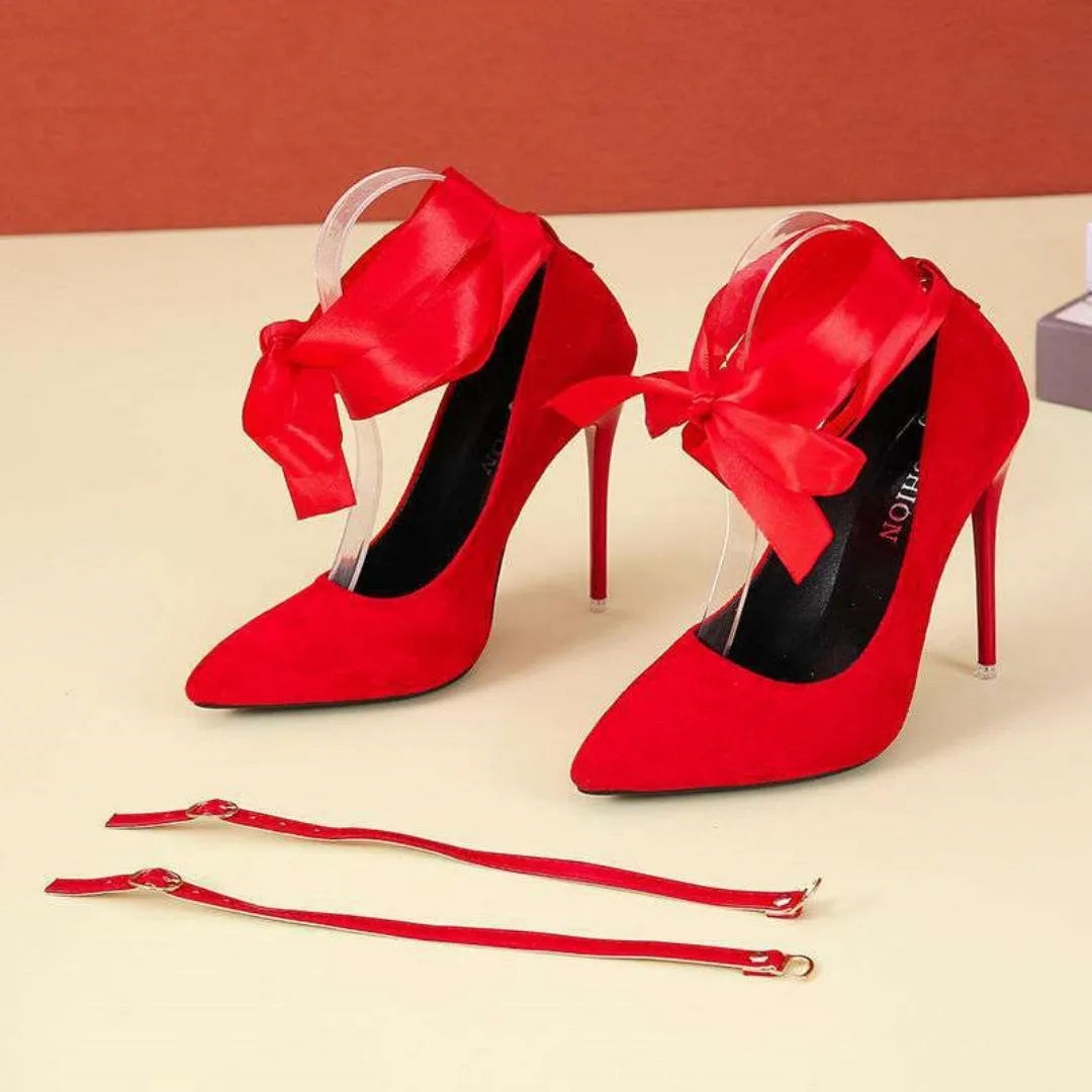 Women's black pointed toe platform heels with a thin fabric strap and a 12cm heel.