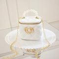 White PVC bucket-shaped gel bag with a heart pattern visible inside the open top.