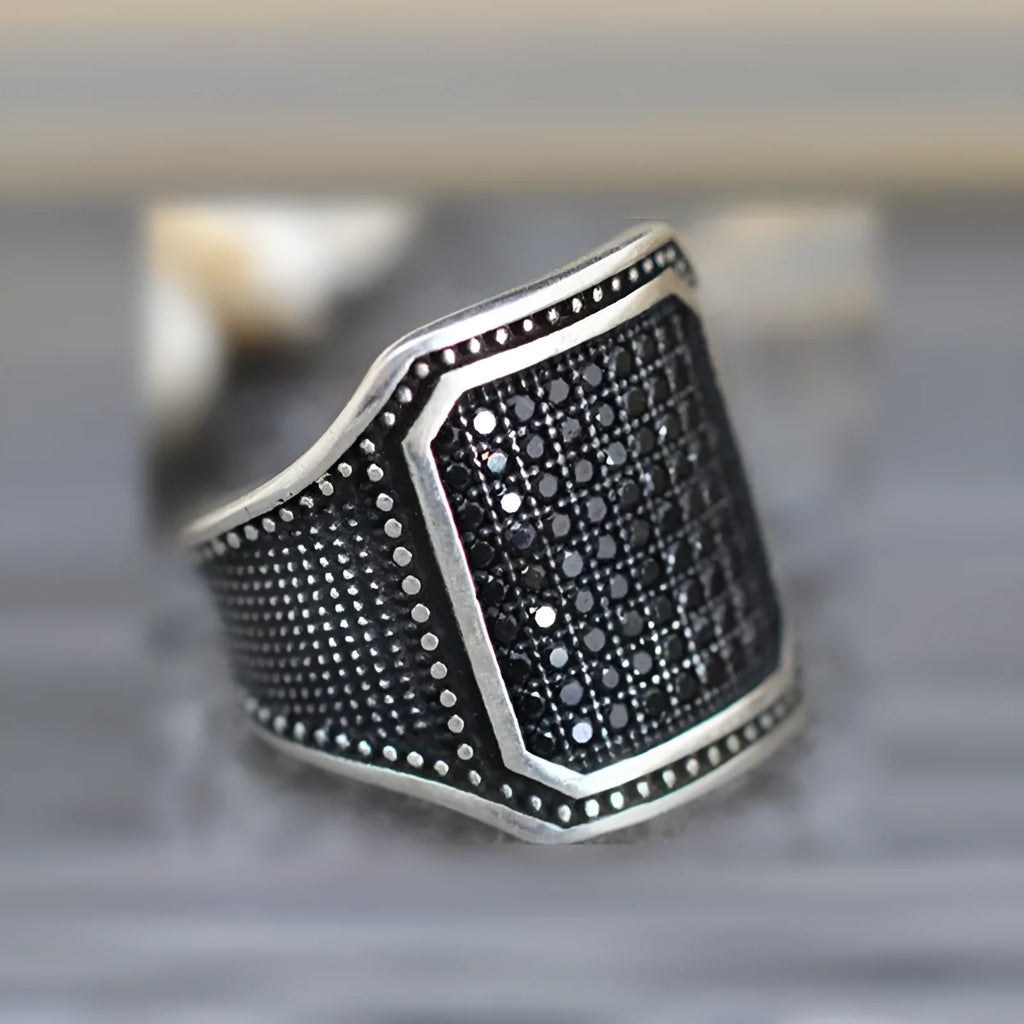 Black alloy ring with copper inlaid zircon detailing in European and American style