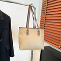 Square black PU underarm shoulder bag with a sandwich pocket design shown from the front.