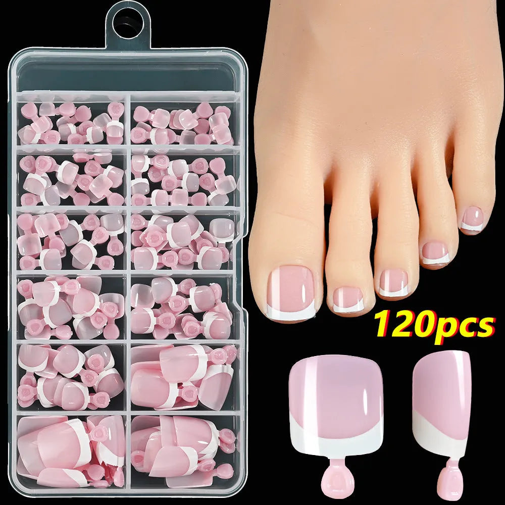 Box of 120 French white edge press-on toe nails in full square short shape showing multiple nude shades.