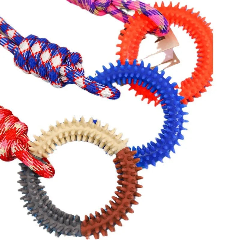 Braided cotton rope knot dog toy in bright colours for biting and tug of war play