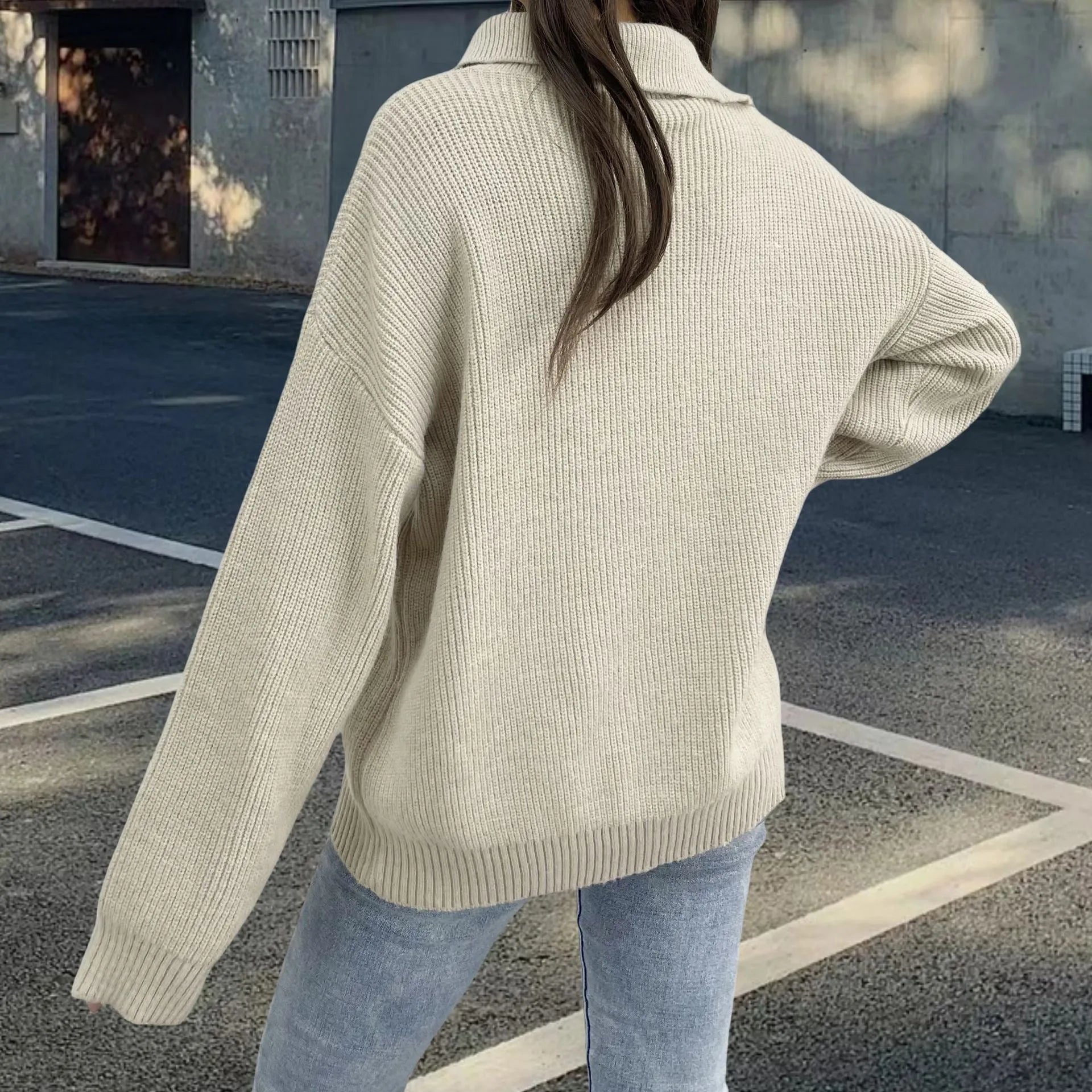 Women's light khaki Alpaca wool pullover sweater with a turtleneck, loose lapels, and a diagonal oblique zipper.