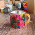 A synthetic resin coffee cup ornament with a book mark theme, shown in Library and Pattern style options.